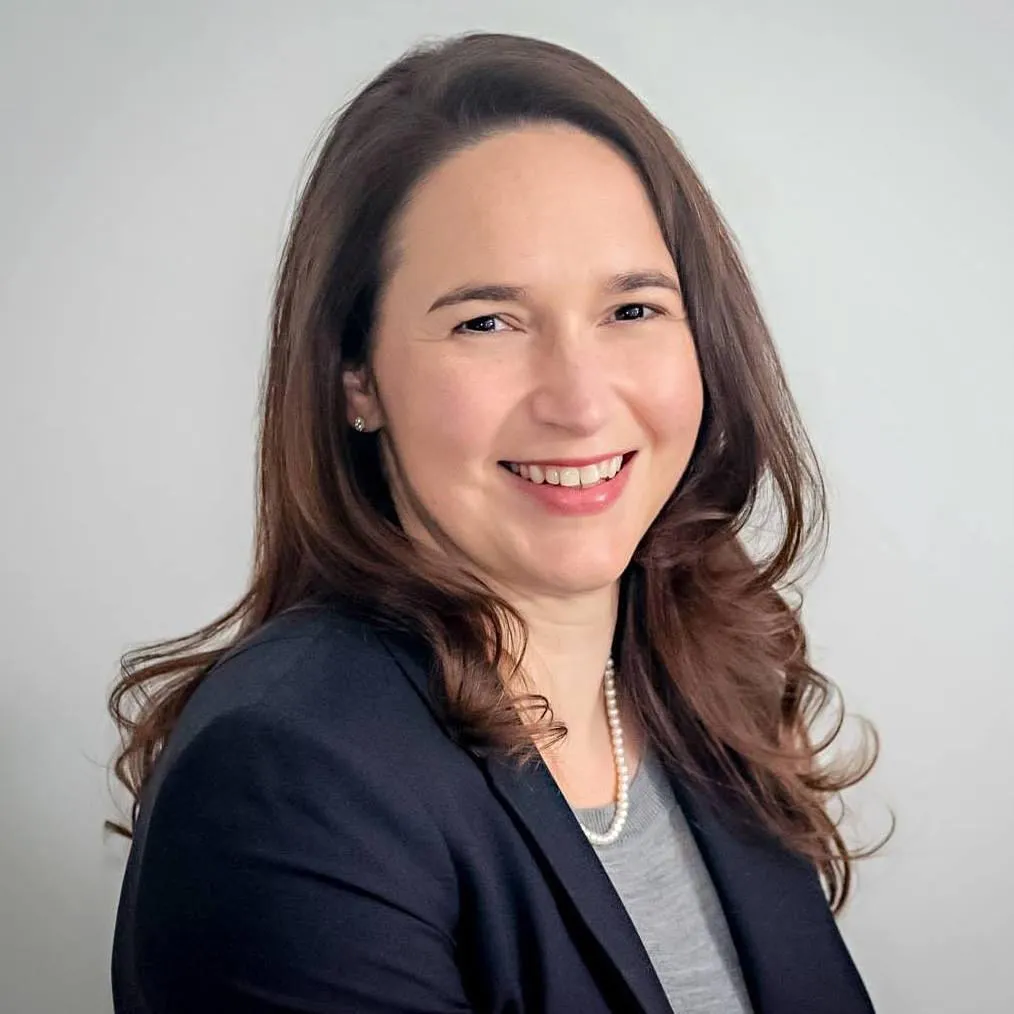Amber Concepcion, a professional headshot.